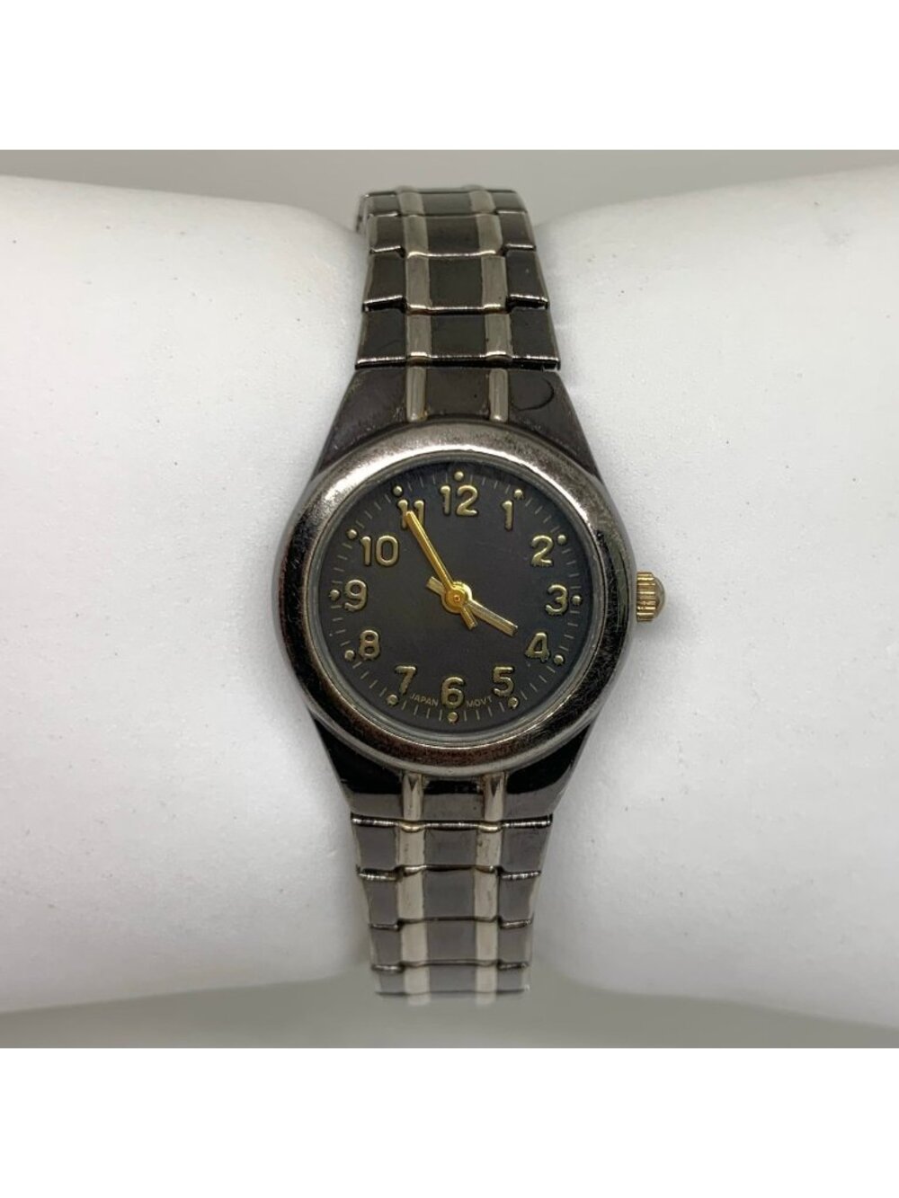 Women’s quartz analog watch 25mm black dial gold tone numerals 6.5” running